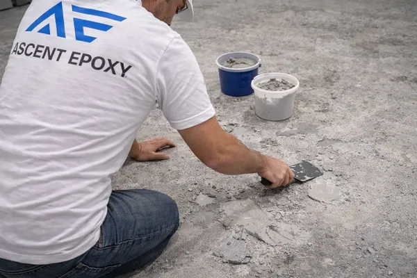Grinding and preparing concrete after coating removal in Sarasota County